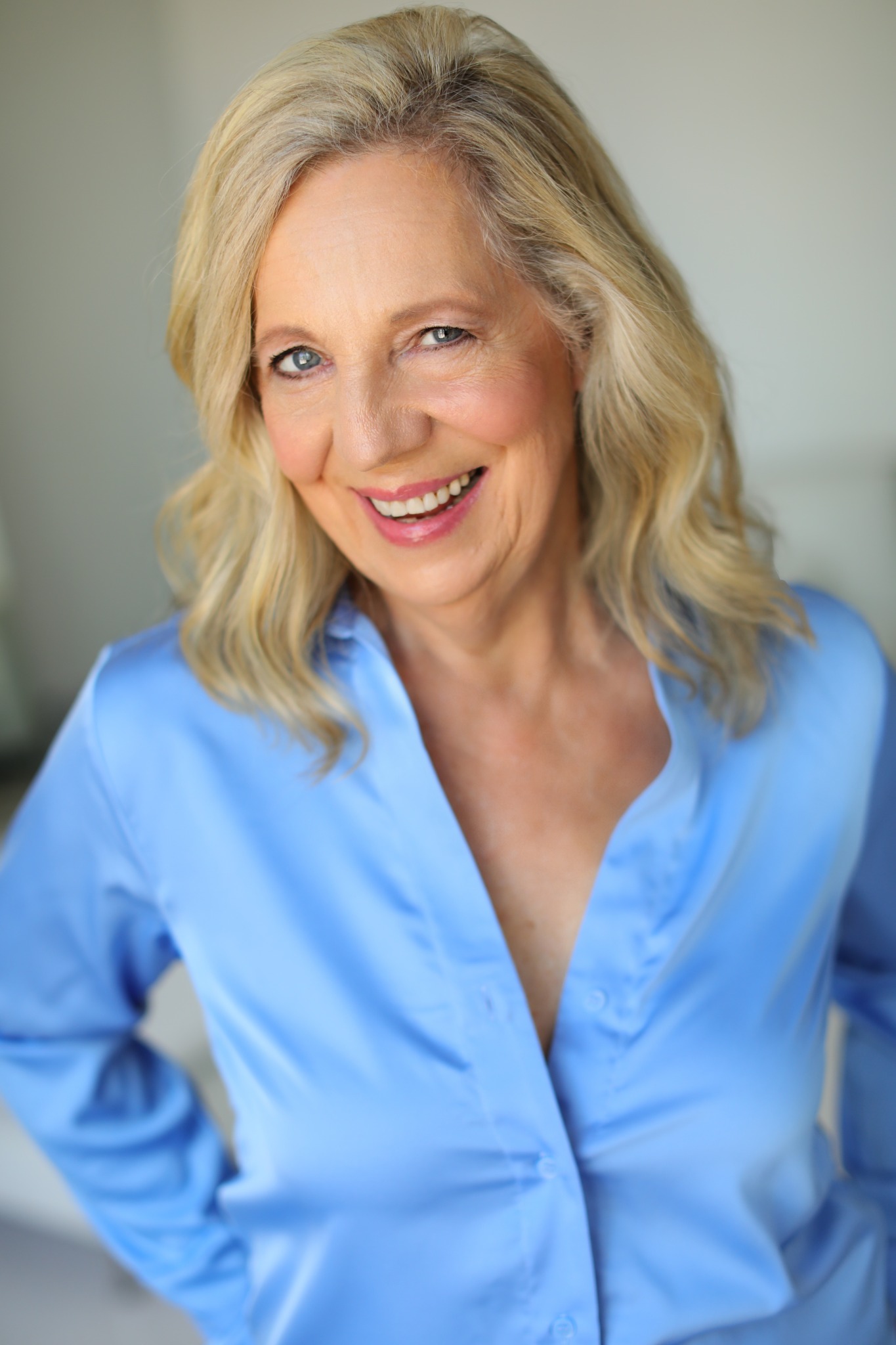Career coach Annie Chadwick smiling in a blue blouse
